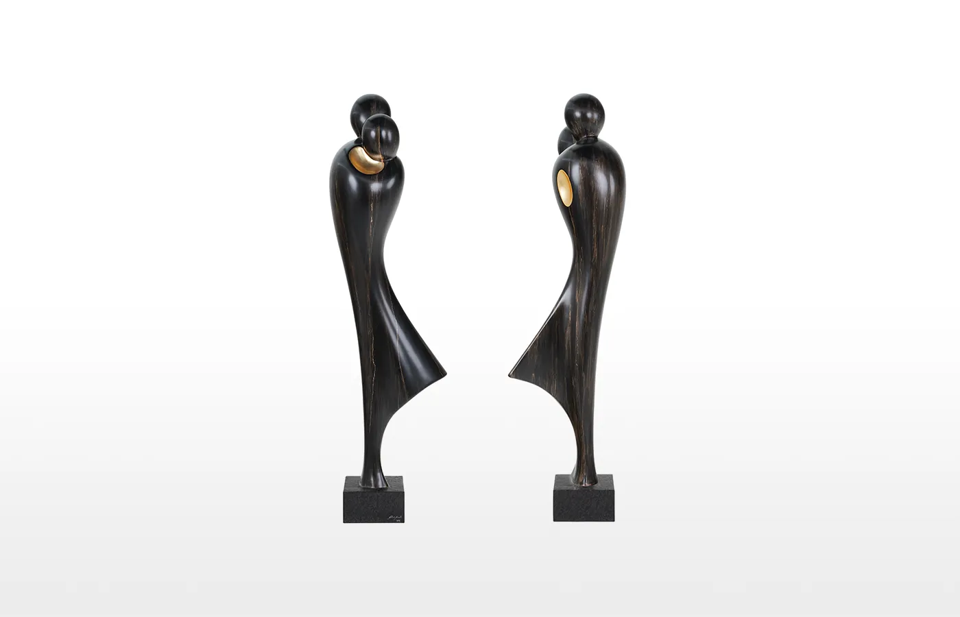 Front and back of the sculpture Abraço in bronze and gold finish