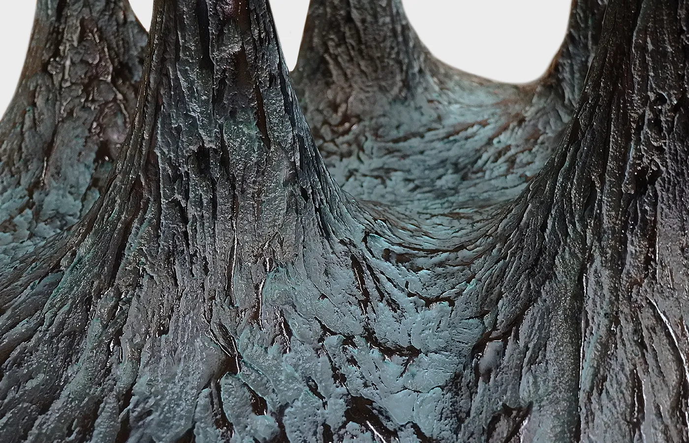 Close up detail of Amazonia dining table in textured green