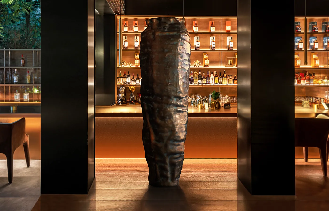 Bar environment with Argus planter in brass color
