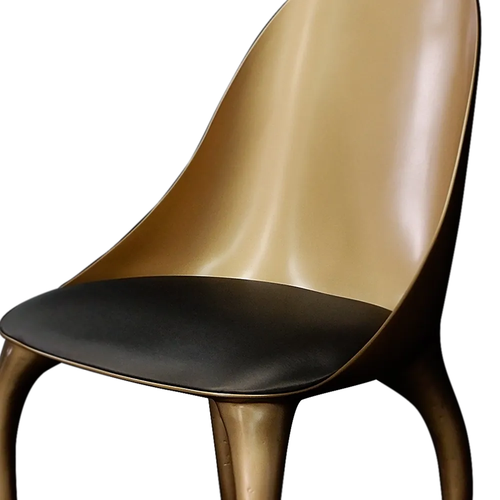 Detailed view of the Daisy chair in gold