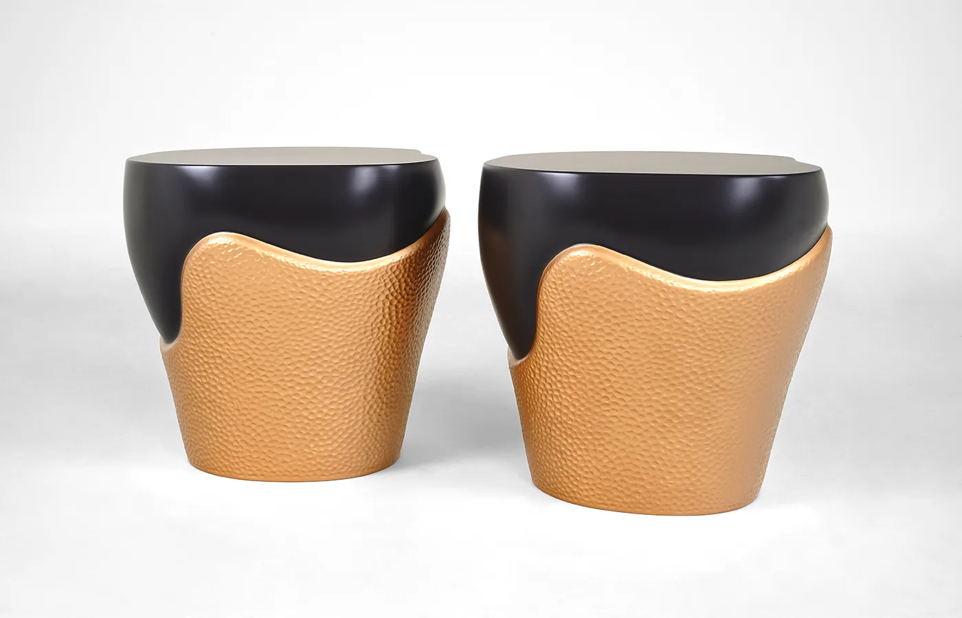 Two Duette side tables in textured gold and gray