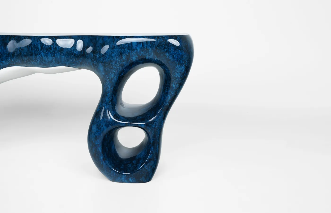 Close-up view of the high-gloss blue marbling on the Elements console