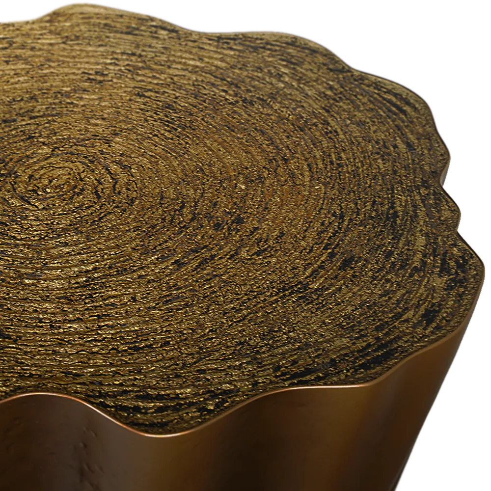 Detailed view of the textured gold leaf top with transparent resin of the Gaia side table
