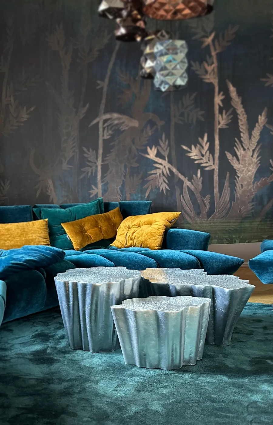 Room setting with Gaia side table set in textured silver leaf
