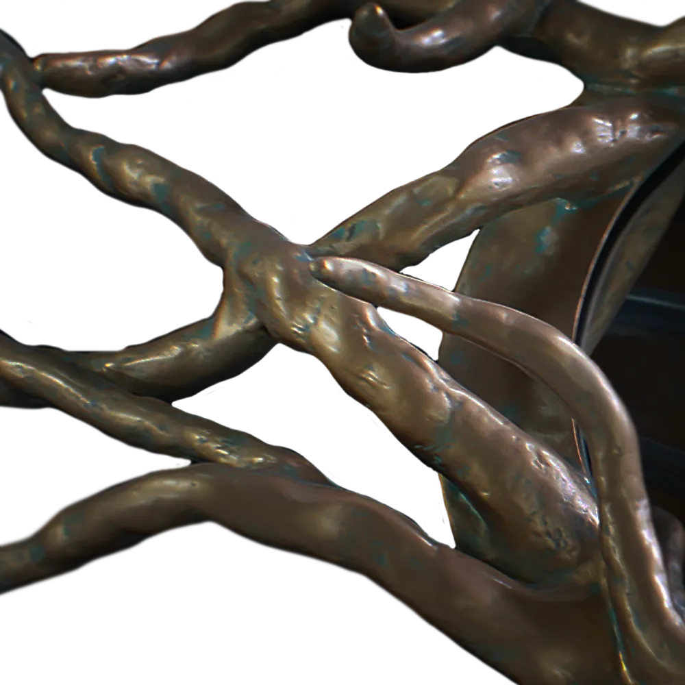 Detailed view of the Helios mirror, highlighting its sun-inspired shape and aged gold finish