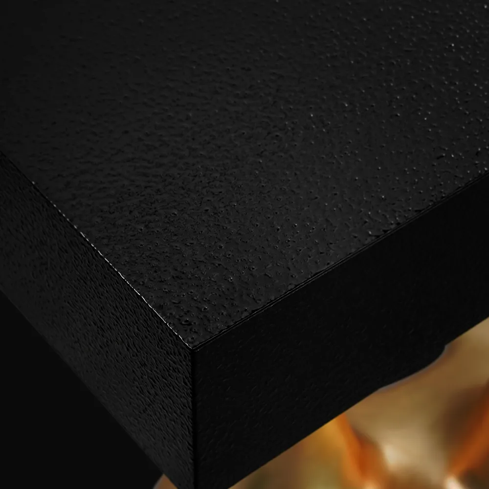 Detalhe aproximado da textura em preto da consola Janus