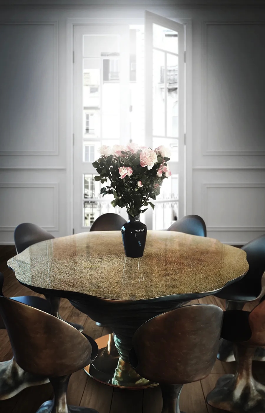 Classic dining environment with Kenya dining table in brass color and textured gold leaf top with Flora chairs