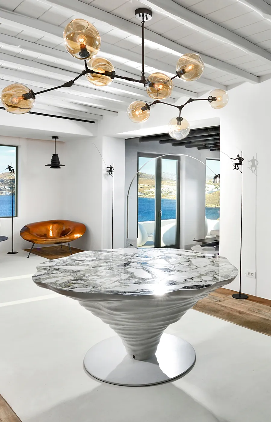 Minimalist and modern living room with Kenya dining table in aged white and ice jade marble top