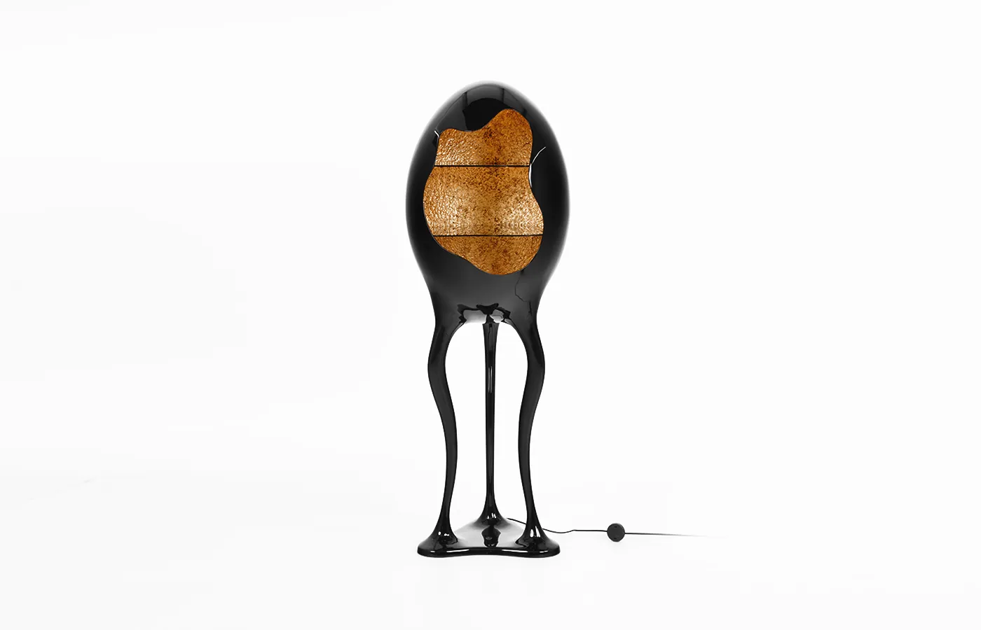 Orion display cabinet in high-gloss black with textured gold leaf interior