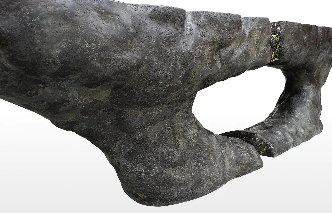 Bottom view of the Pompeia console, highlighting its volcanic finish/texture