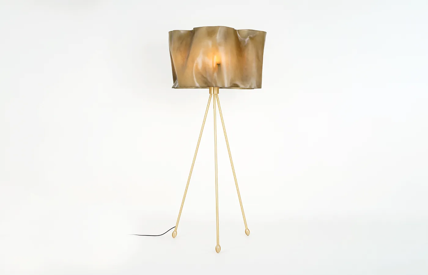 Ruby floor lamp with brushed brass structure lampshade in aged natural fiberglass with lights on