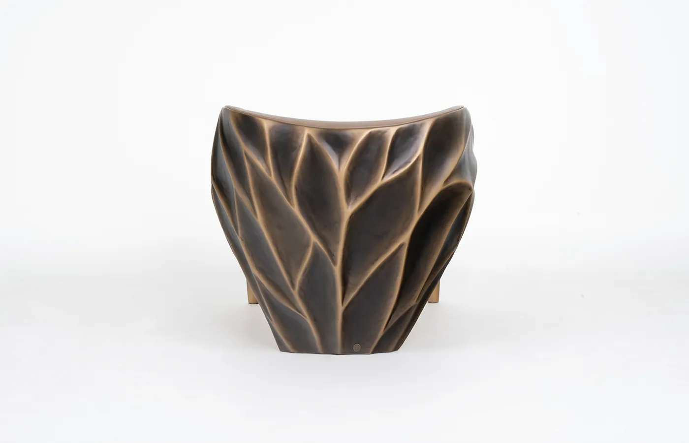 Backside view of Triton armchair in aged gold finish and brown leather upholstery