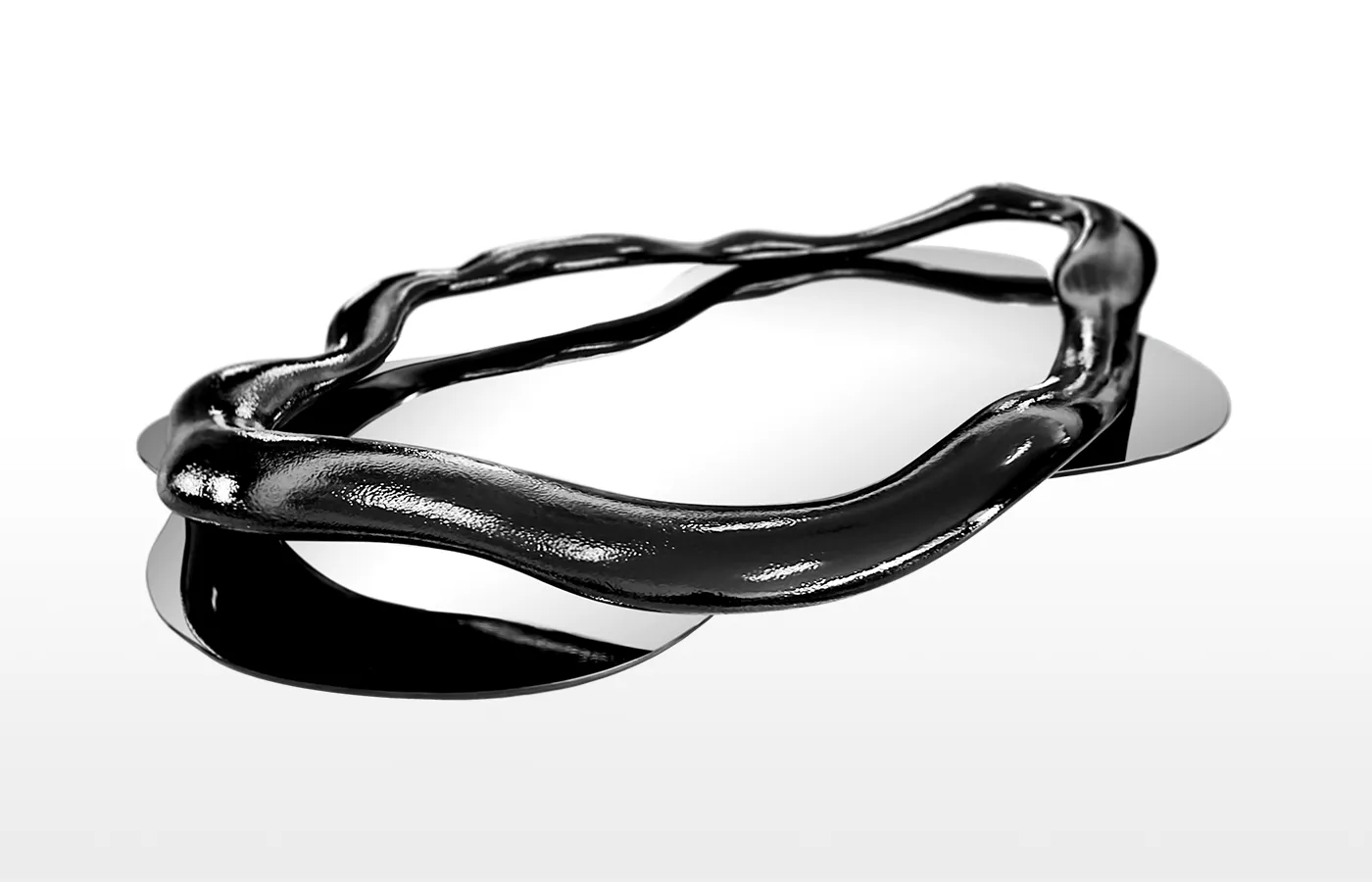 Side view detail of the large Twisted mirror in high-gloss textured black