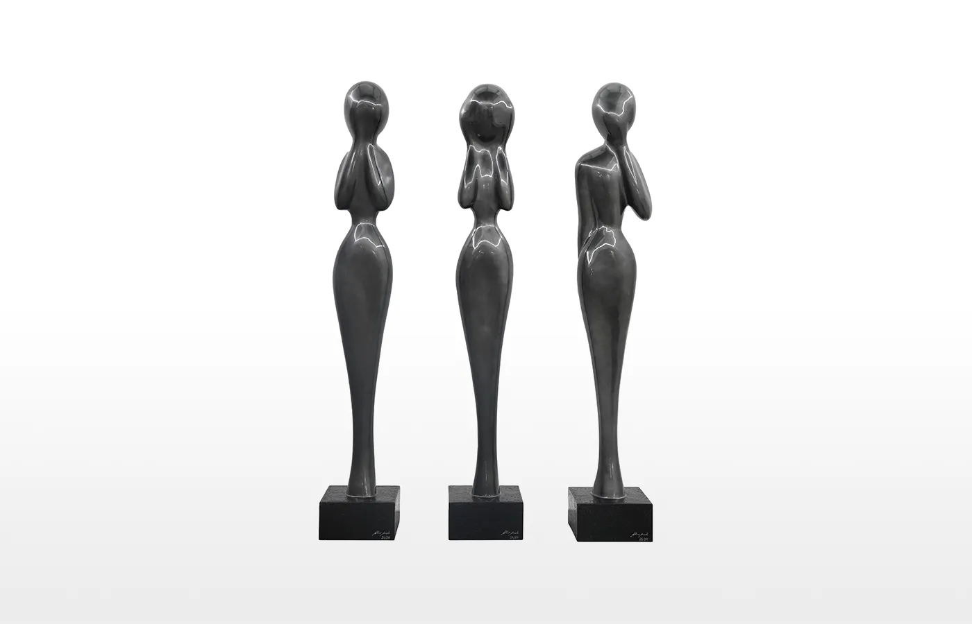 Conjunto de esculturas Wisdom em acabamento cor chumbo e base em textura vulcânica